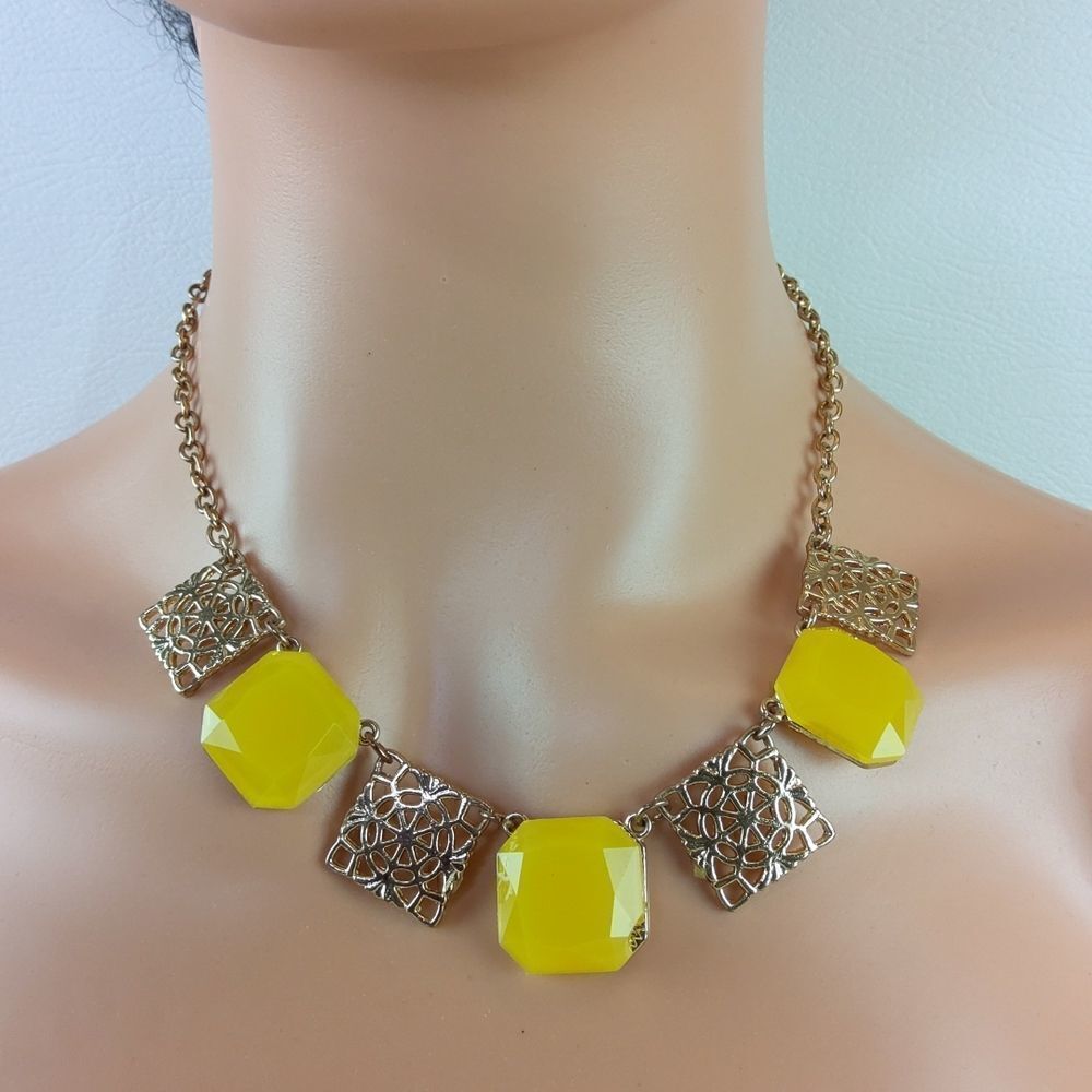 (3/$20) Fashion jewelry faux yellow gems with gold tone chain.